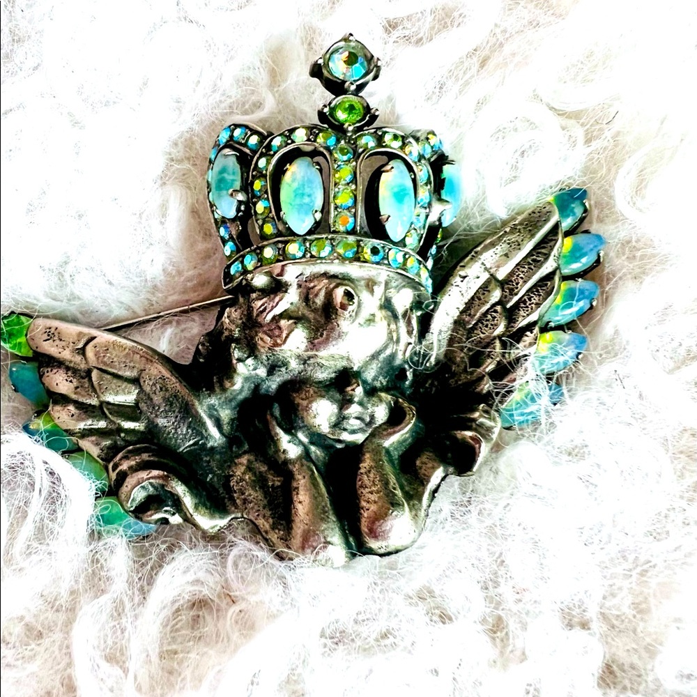 Cherub brooch by Danny Pollak